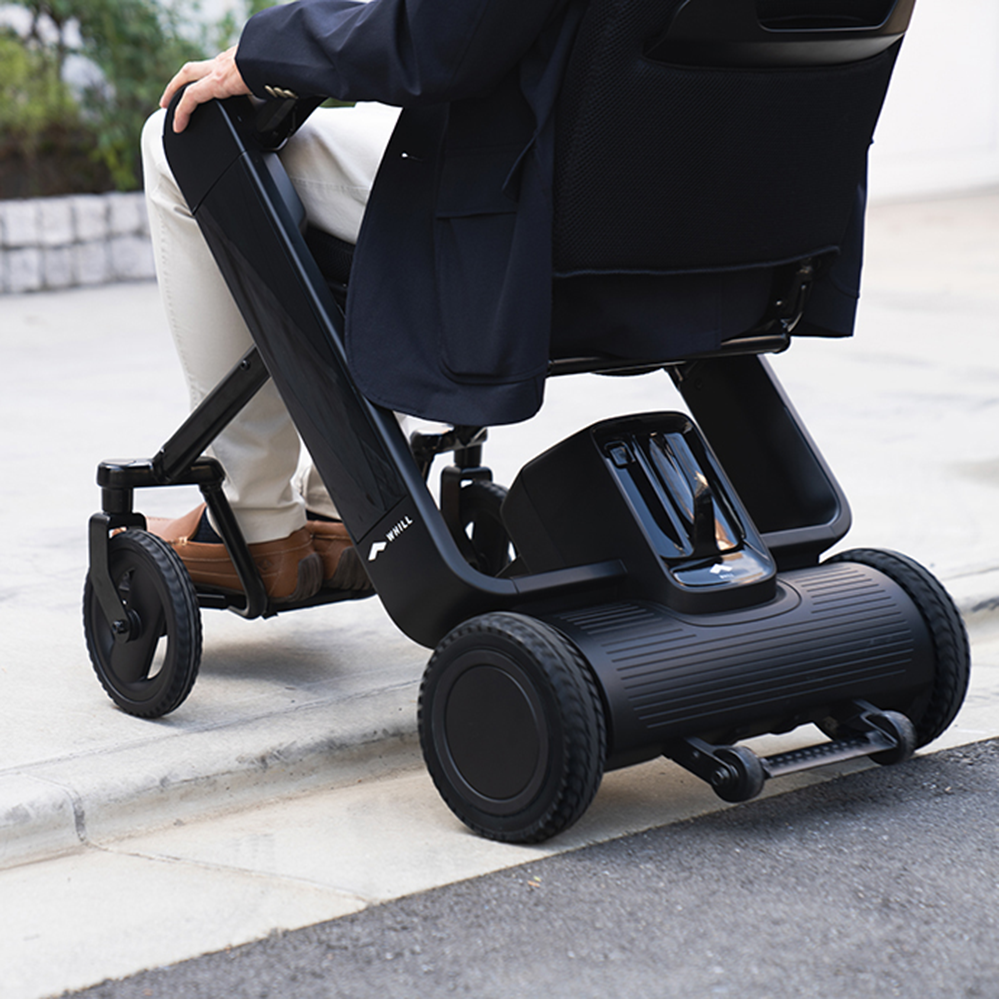 WHILL Model Fi Folding Travel Power Wheelchair