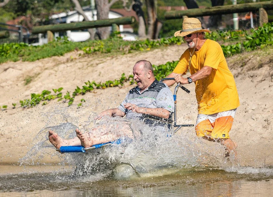 Beach Wheelchair Made with Balloon Tires and Rotating Casters - Wheeleez Sandcruiser